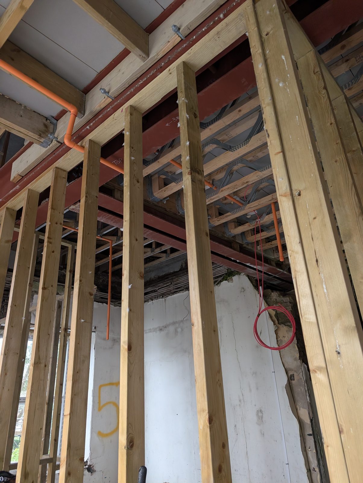 New steelwork and structural timber framing within the building